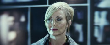 Movie still from “Maniac” (2012), directed by Franck Khalfoun – A person wearing a jacket and looking at the camera; Close Up shot, Over the shoulder angle