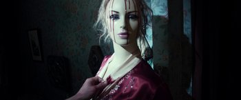 Movie still from “Maniac” (2012), directed by Franck Khalfoun – A woman with blood dripping down her face; Close Up shot, High angle