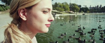 Movie still from “Maniac” (2012), directed by Franck Khalfoun – A woman standing in front of a body of water; Close Up shot, Low angle