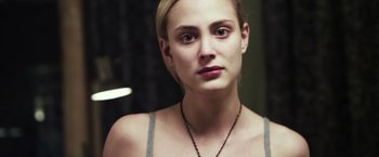 Movie still from “Maniac” (2012), directed by Franck Khalfoun – A person wearing a necklace; Close Up shot, Over the shoulder angle
