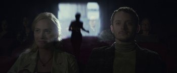 Movie still from “Maniac” (2012), directed by Franck Khalfoun – A man and a woman in a dark room; Close Up shot, Over the shoulder angle