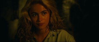 Movie still from “Manon of the Spring” (1986), directed by Claude Berri – A person with long blonde hair; Close Up shot, Over the shoulder angle