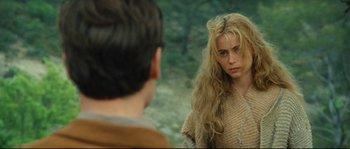 Movie still from “Manon of the Spring” (1986), directed by Claude Berri – A woman with long blonde hair looking into a mirror; Close Up shot, Over the shoulder angle