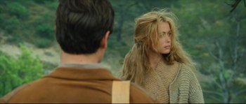 Movie still from “Manon of the Spring” (1986), directed by Claude Berri – A man and a woman looking at one another in a mirror; Medium shot, Over the shoulder angle