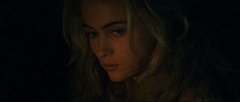 Movie still from “Manon of the Spring” (1986), directed by Claude Berri – A person with blonde hair; Close Up shot, High angle