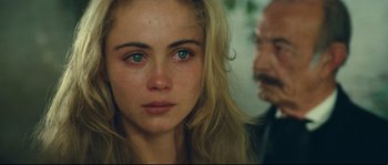 Movie still from “Manon of the Spring” (1986), directed by Claude Berri – A woman's eyes and face; Close Up shot, High angle