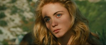 Movie still from “Manon of the Spring” (1986), directed by Claude Berri – A woman's face with blue eyes; Close Up shot, Over the shoulder angle