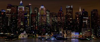 Movie still from “Map of the Human Heart” (1992), directed by Vincent Ward – A view of a large city at night time; Extreme Wide shot, High angle