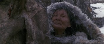 Movie still from “Map of the Human Heart” (1992), directed by Vincent Ward – An older woman wearing a fur coat and a fur hat; Close Up shot, Low angle