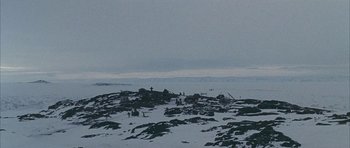 Movie still from “Map of the Human Heart” (1992), directed by Vincent Ward – A view of the ocean from the beach; Extreme Wide shot, High angle