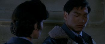 Movie still from “Map of the Human Heart” (1992), directed by Vincent Ward – A man and a woman are talking to each other; Close Up shot, Over the shoulder angle