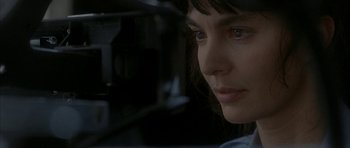 Movie still from “Map of the Human Heart” (1992), directed by Vincent Ward – A person looking at the camera; Close Up shot, Over the shoulder angle