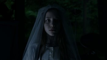 Movie still from “Maps to the Stars” (2014), directed by David Cronenberg – A young girl in a white dress and a veil; Close Up shot, Low angle