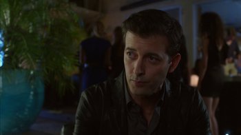 Movie still from “Maps to the Stars” (2014), directed by David Cronenberg – A person sitting in a room; Close Up shot, Over the shoulder angle