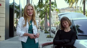 Movie still from “Maps to the Stars” (2014), directed by David Cronenberg – Two women standing on the side of the street; Medium shot, Low angle
