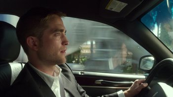 Movie still from “Maps to the Stars” (2014), directed by David Cronenberg – A person in a car; Close Up shot, Over the shoulder angle