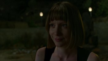 Movie still from “Maps to the Stars” (2014), directed by David Cronenberg – A person with short brown hair; Close Up shot, Over the shoulder angle