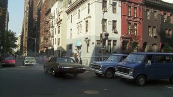 Movie still from “Marathon Man” (1976), directed by John Schlesinger – A couple of cars parked on the side of the street; Extreme Wide shot, High angle