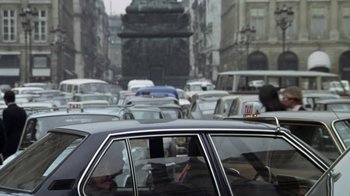 Movie still from “Marathon Man” (1976), directed by John Schlesinger – A bunch of cars that are in the street; Wide shot, High angle