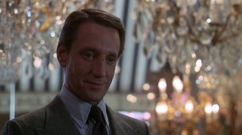 Movie still from “Marathon Man” (1976), directed by John Schlesinger – A person wearing a suit and tie; Close Up shot, Low angle