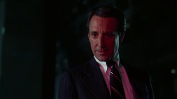 Movie still from “Marathon Man” (1976), directed by John Schlesinger – A person wearing a suit and tie; Close Up shot, Low angle