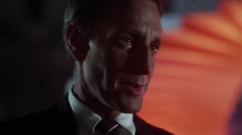 Movie still from “Marathon Man” (1976), directed by John Schlesinger – A person wearing a suit and tie; Close Up shot, Low angle