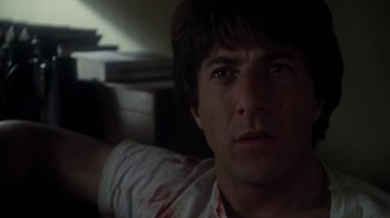 Movie still from “Marathon Man” (1976), directed by John Schlesinger – A person wearing a white shirt; Close Up shot, Low angle