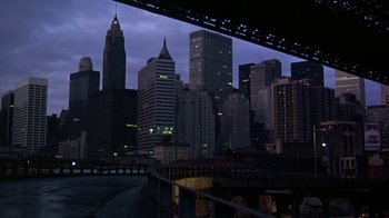 Movie still from “Marathon Man” (1976), directed by John Schlesinger – A view of a city skyline at night time; Extreme Wide shot, High angle