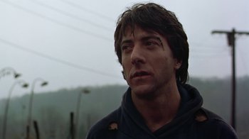 Movie still from “Marathon Man” (1976), directed by John Schlesinger – A person wearing a hooded sweatshirt; Close Up shot, Low angle