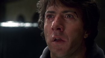Movie still from “Marathon Man” (1976), directed by John Schlesinger – A person with a tear in his eye; Close Up shot, Low angle