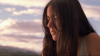 Movie still from “Maria Full of Grace” (2004), directed by Joshua Marston – A person with long brown hair; Close Up shot, Low angle