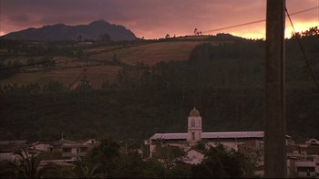Movie still from “Maria Full of Grace” (2004), directed by Joshua Marston – A view of a church in the middle of a mountainous area; Extreme Wide shot, Low angle