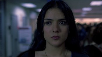 Movie still from “Maria Full of Grace” (2004), directed by Joshua Marston – A person with long black hair; Close Up shot, Low angle