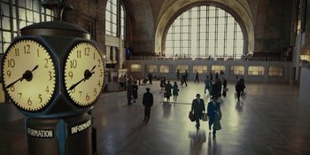 Movie still from “Marshall” (2017), directed by Reginald Hudlin – A group of people walking around a train station; Extreme Wide shot, High angle