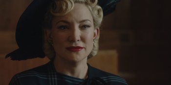 Movie still from “Marshall” (2017), directed by Reginald Hudlin – A person wearing a dress; Close Up shot, Over the shoulder angle