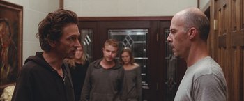 Movie still from “Martha Marcy May Marlene” (2011), directed by Sean Durkin – A group of people standing in front of each other; Medium shot, Over the shoulder angle