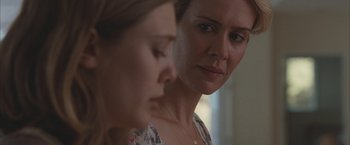 Movie still from “Martha Marcy May Marlene” (2011), directed by Sean Durkin – Two women looking at each other in front of a mirror; Close Up shot, Over the shoulder angle