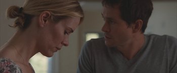 Movie still from “Martha Marcy May Marlene” (2011), directed by Sean Durkin – A man and a woman looking at one another; Close Up shot, Over the shoulder angle