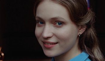 Movie still from “Martin Eden” (2019), directed by Pietro Marcello – A person with blue eyes; Close Up shot, High angle