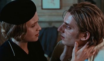 Movie still from “Martin Eden” (2019), directed by Pietro Marcello – A man and a woman looking at one another; Close Up shot, Over the shoulder angle