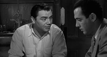 Movie still from “Marty” (1955), directed by Delbert Mann – Two men are sitting in a room talking to each other; Close Up shot, Over the shoulder angle
