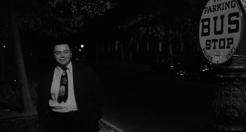 Movie still from “Marty” (1955), directed by Delbert Mann – A black and white photo of a man in a suit and tie; Medium shot, Low angle