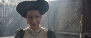 Movie still from “Mary Queen of Scots” (2018), directed by Josie Rourke – A woman in a medieval dress looking at the camera; Close Up shot, Over the shoulder angle