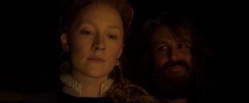 Movie still from “Mary Queen of Scots” (2018), directed by Josie Rourke – A woman and a bearded man are looking at the camera; Close Up shot, Over the shoulder angle