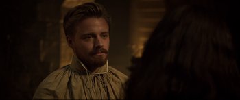 Movie still from “Mary Queen of Scots” (2018), directed by Josie Rourke – A man with a long beard looking into a mirror; Close Up shot, Over the shoulder angle