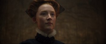 Movie still from “Mary Queen of Scots” (2018), directed by Josie Rourke – A person wearing a dress; Close Up shot, Low angle