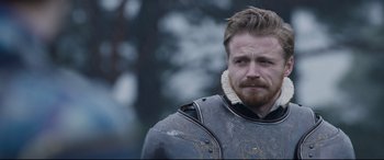 Movie still from “Mary Queen of Scots” (2018), directed by Josie Rourke – A person wearing a suit of armor; Close Up shot, Over the shoulder angle