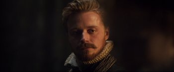 Movie still from “Mary Queen of Scots” (2018), directed by Josie Rourke – A person with a beard; Close Up shot, Over the shoulder angle