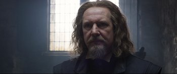 Movie still from “Mary Queen of Scots” (2018), directed by Josie Rourke – A person with long hair and a beard; Close Up shot, Over the shoulder angle