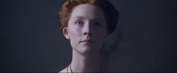 Movie still from “Mary Queen of Scots” (2018), directed by Josie Rourke – A person wearing a necklace; Close Up shot, Low angle